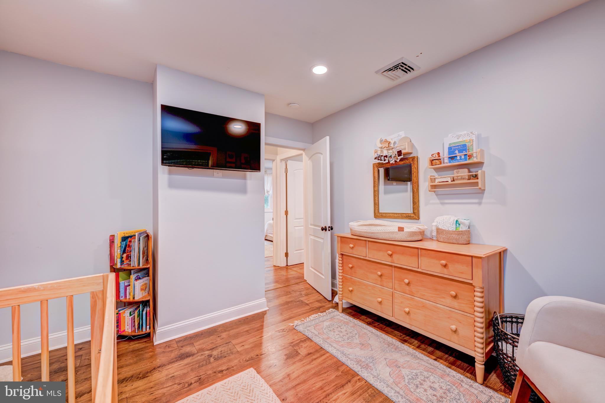 215 Murray Drive Doylestown, PA 18901 - Photo 19 of 29 a room with a bed and a television