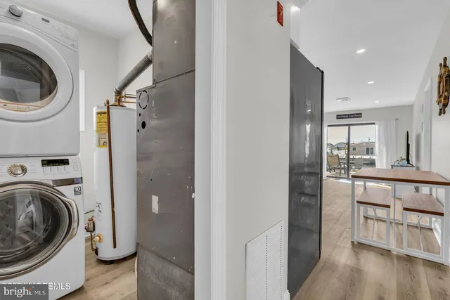 a view of a kitchen and washer and dryer