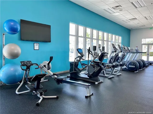 a view of a room with gym equipment