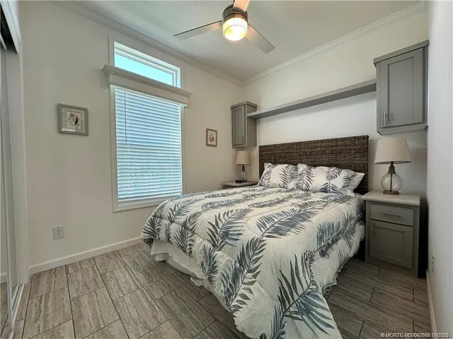 a bathroom with a granite countertop toilet a sink and a mirror