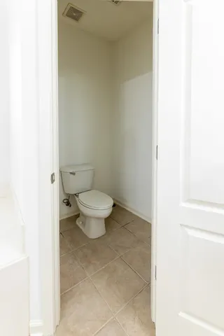 a bathroom with a toilet