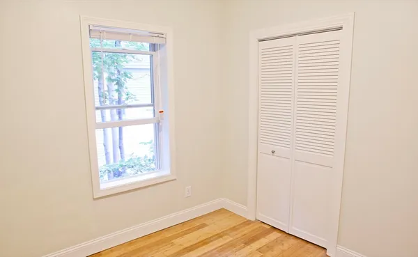 a view of a room that has a window in it