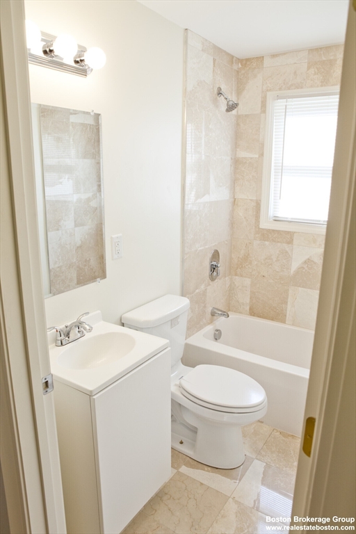 35 Forbes Street, Unit 2 Boston, MA 02130 - Photo 10 of 11 a bathroom with a toilet sink and a bathtub