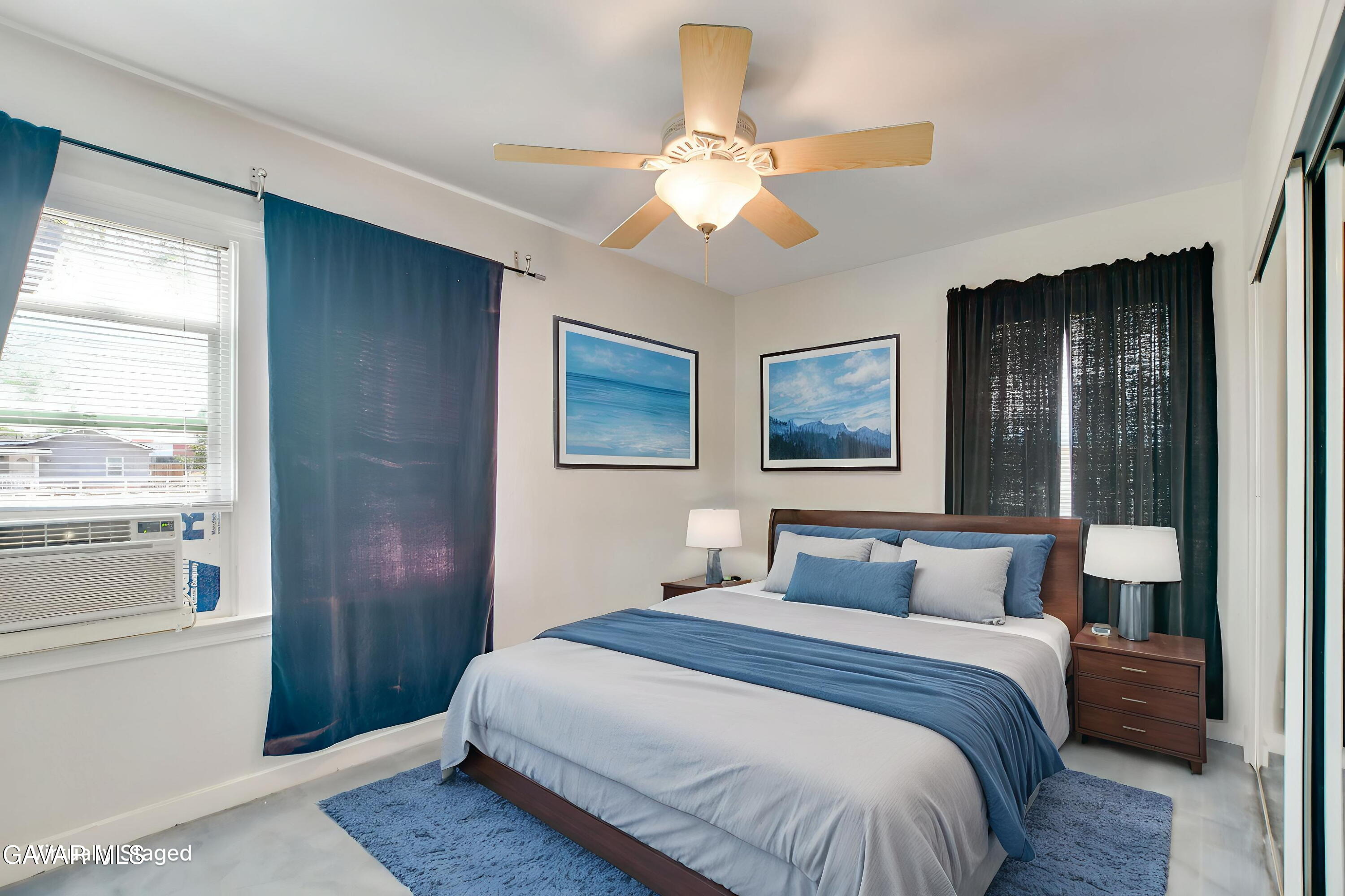 43517 7th Street East Lancaster, CA 93535 - Photo 15 of 47 a bedroom with a large bed and a window