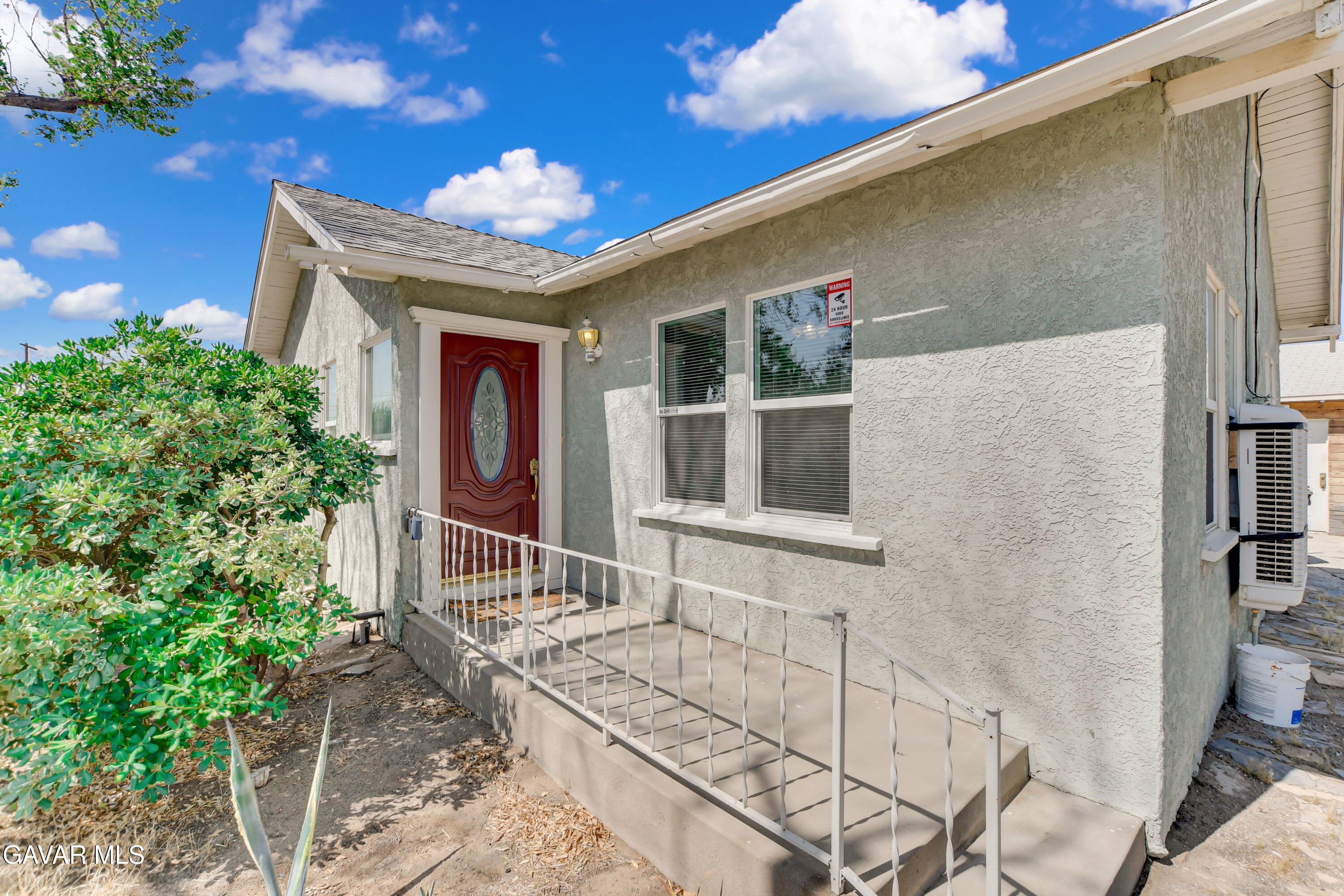 43517 7th Street East Lancaster, CA 93535 - Photo 3 of 47 a front view of a house with entryway