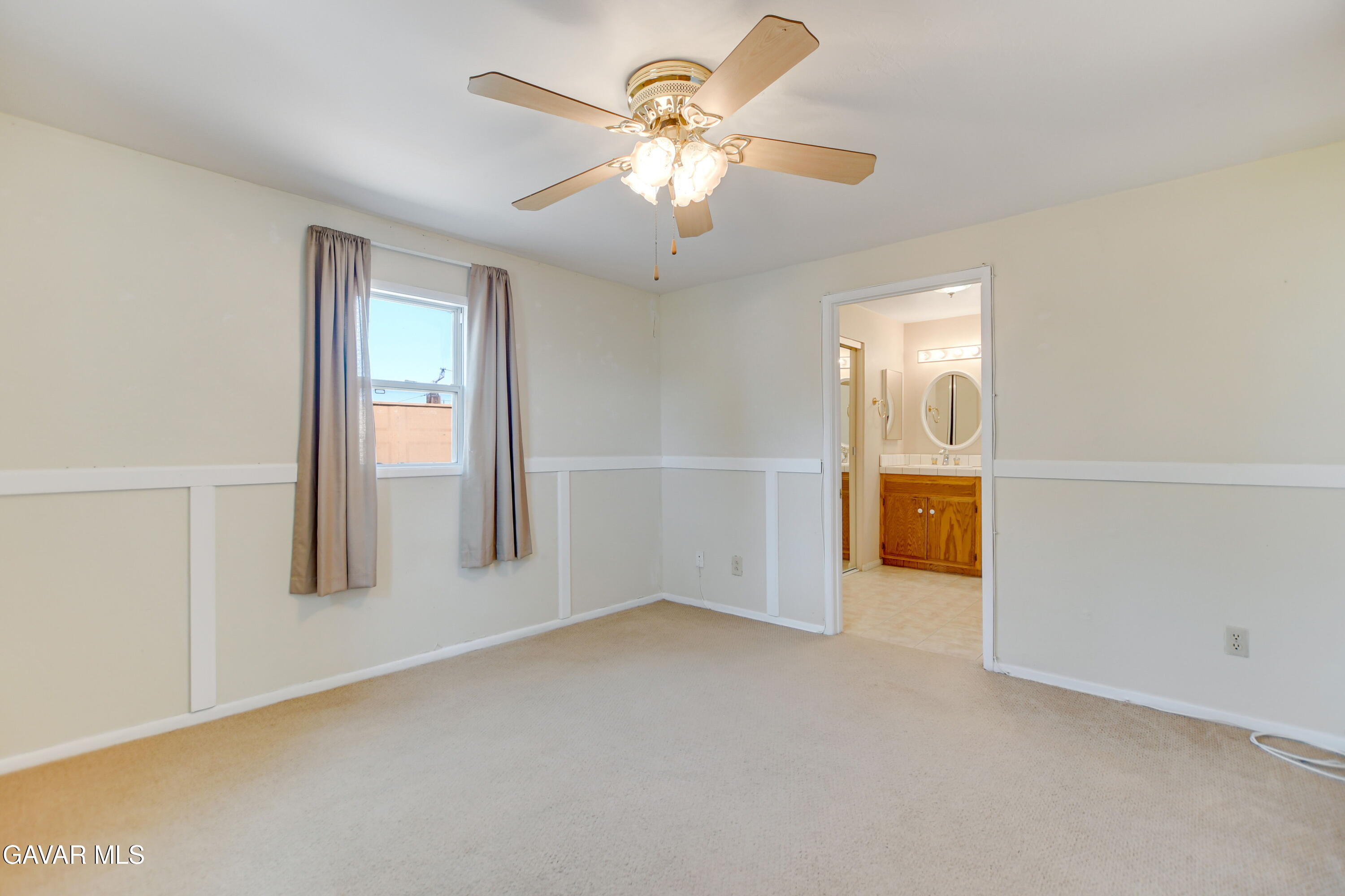 43517 7th Street East Lancaster, CA 93535 - Photo 36 of 47 a view of a livingroom with a chandelier fan