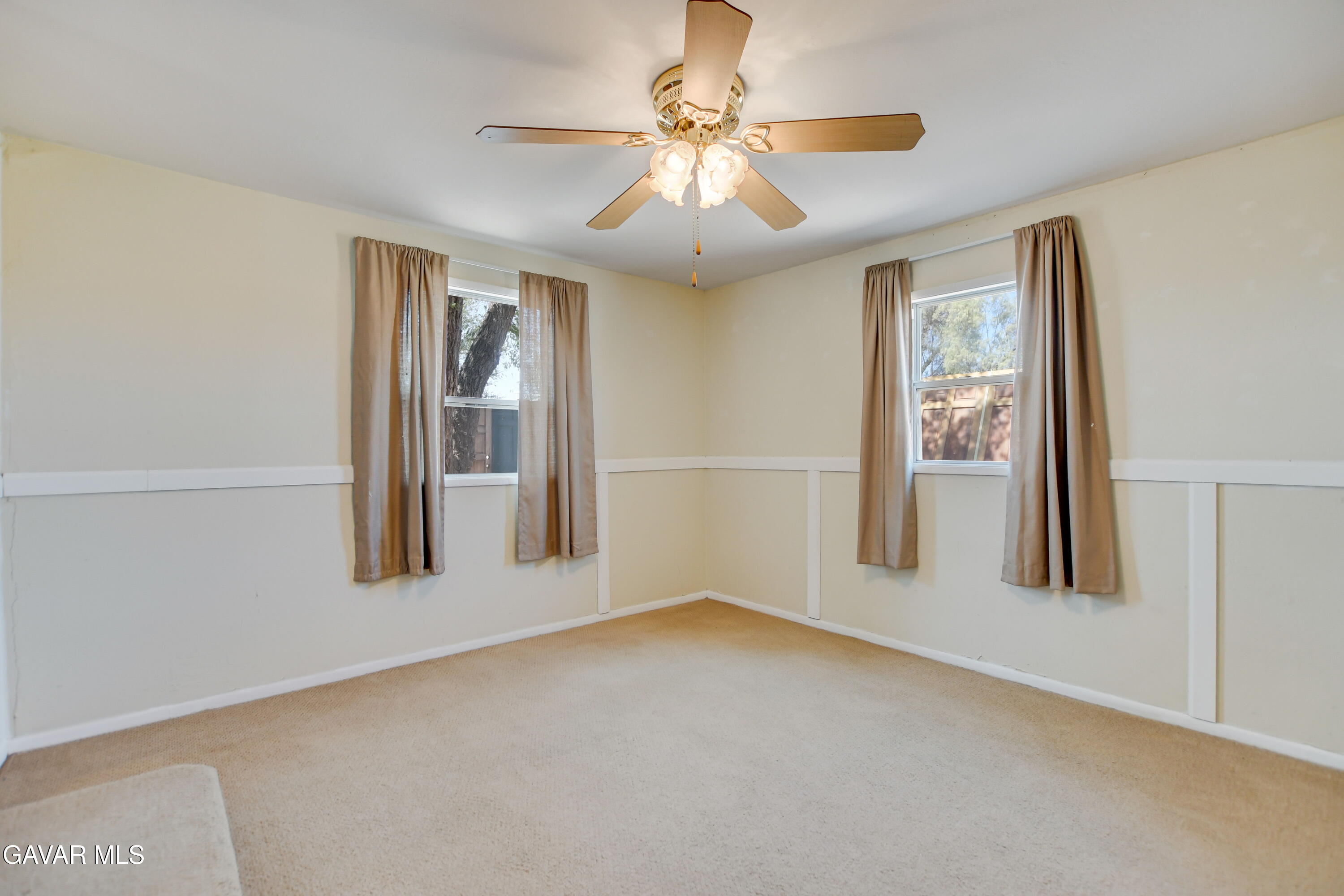43517 7th Street East Lancaster, CA 93535 - Photo 37 of 47 an empty room with windows and cabinet