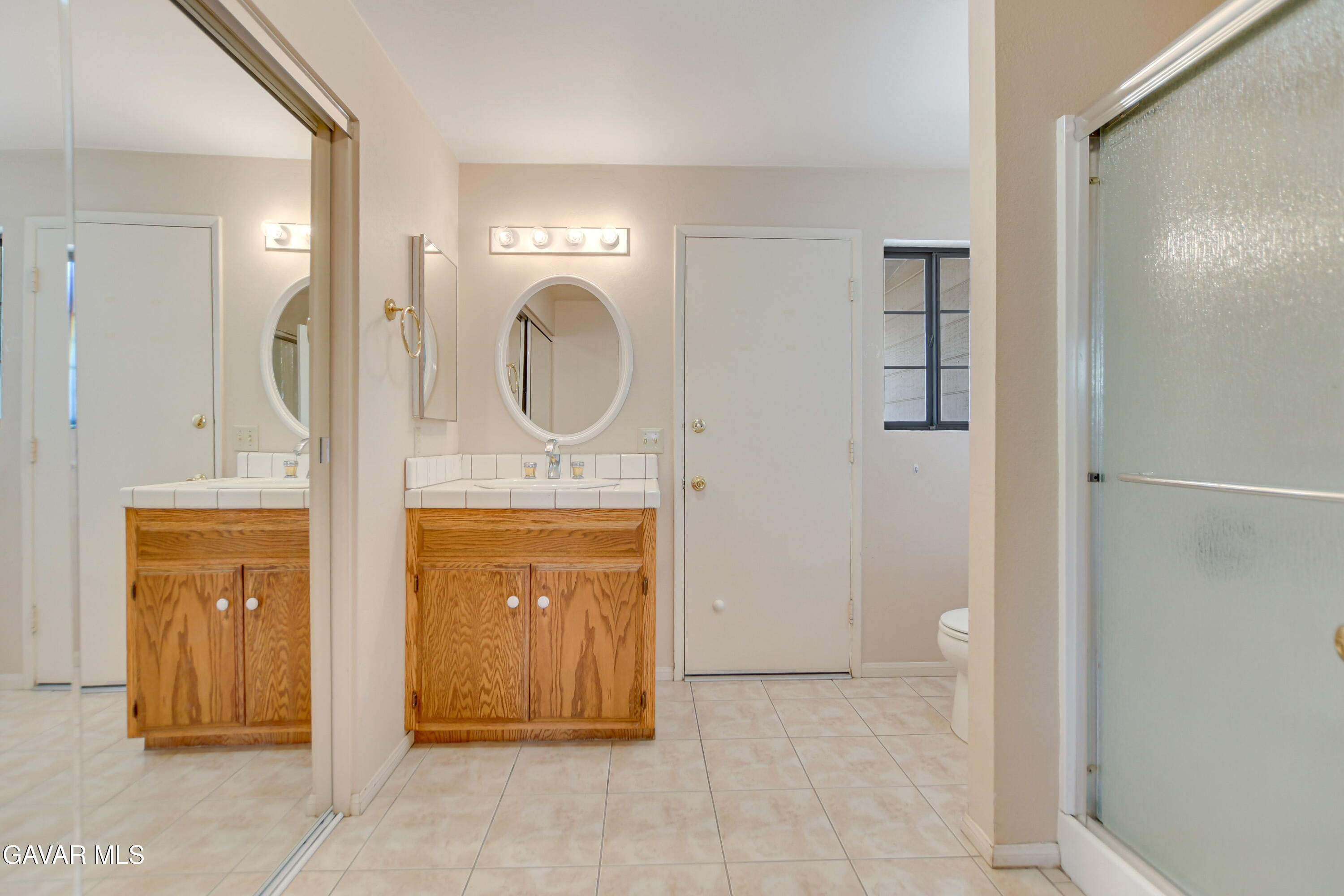 43517 7th Street East Lancaster, CA 93535 - Photo 38 of 47 a view of a bathroom from the hallway