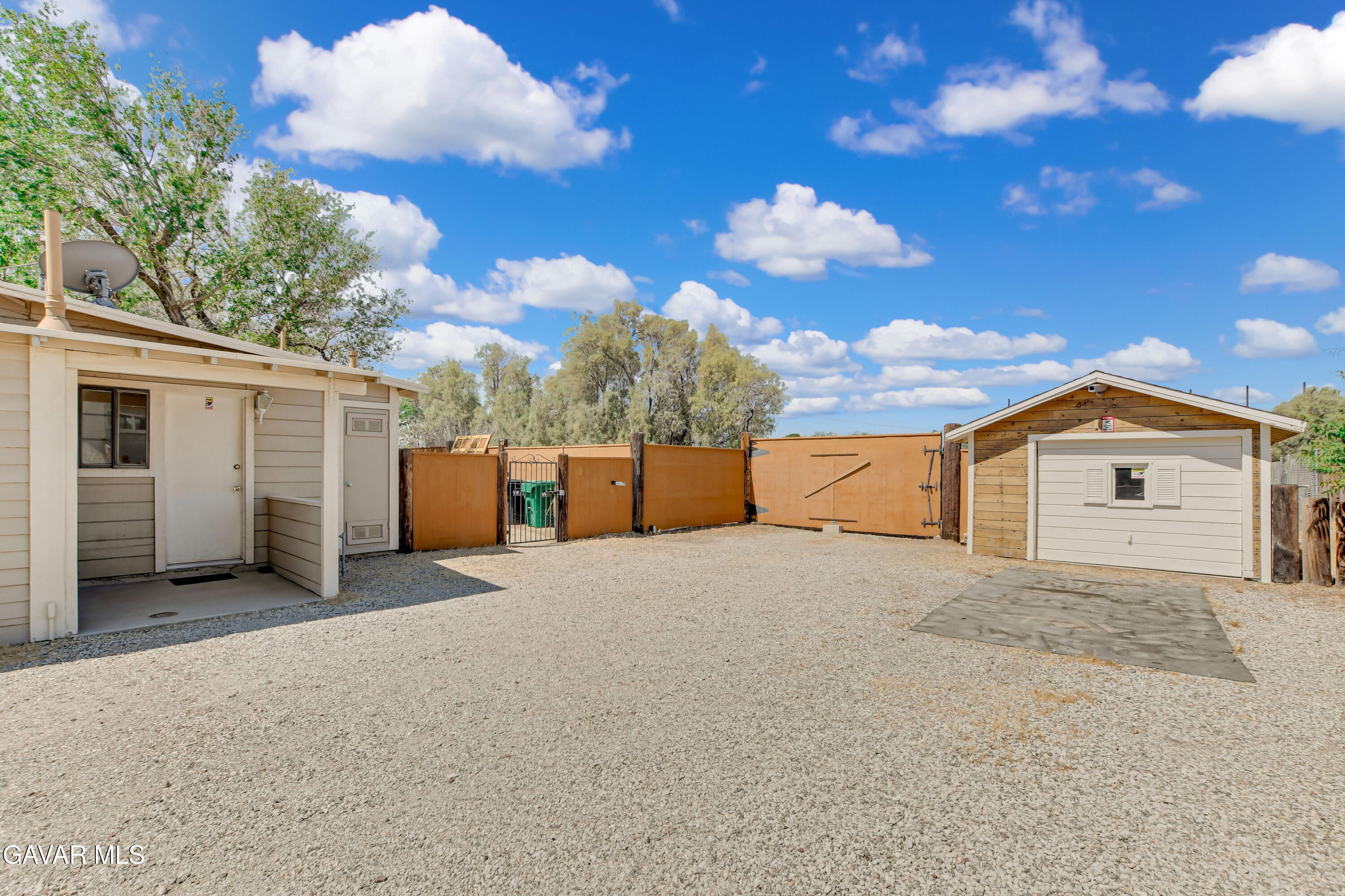 43517 7th Street East Lancaster, CA 93535 - Photo 43 of 47 a view of a house with a yard