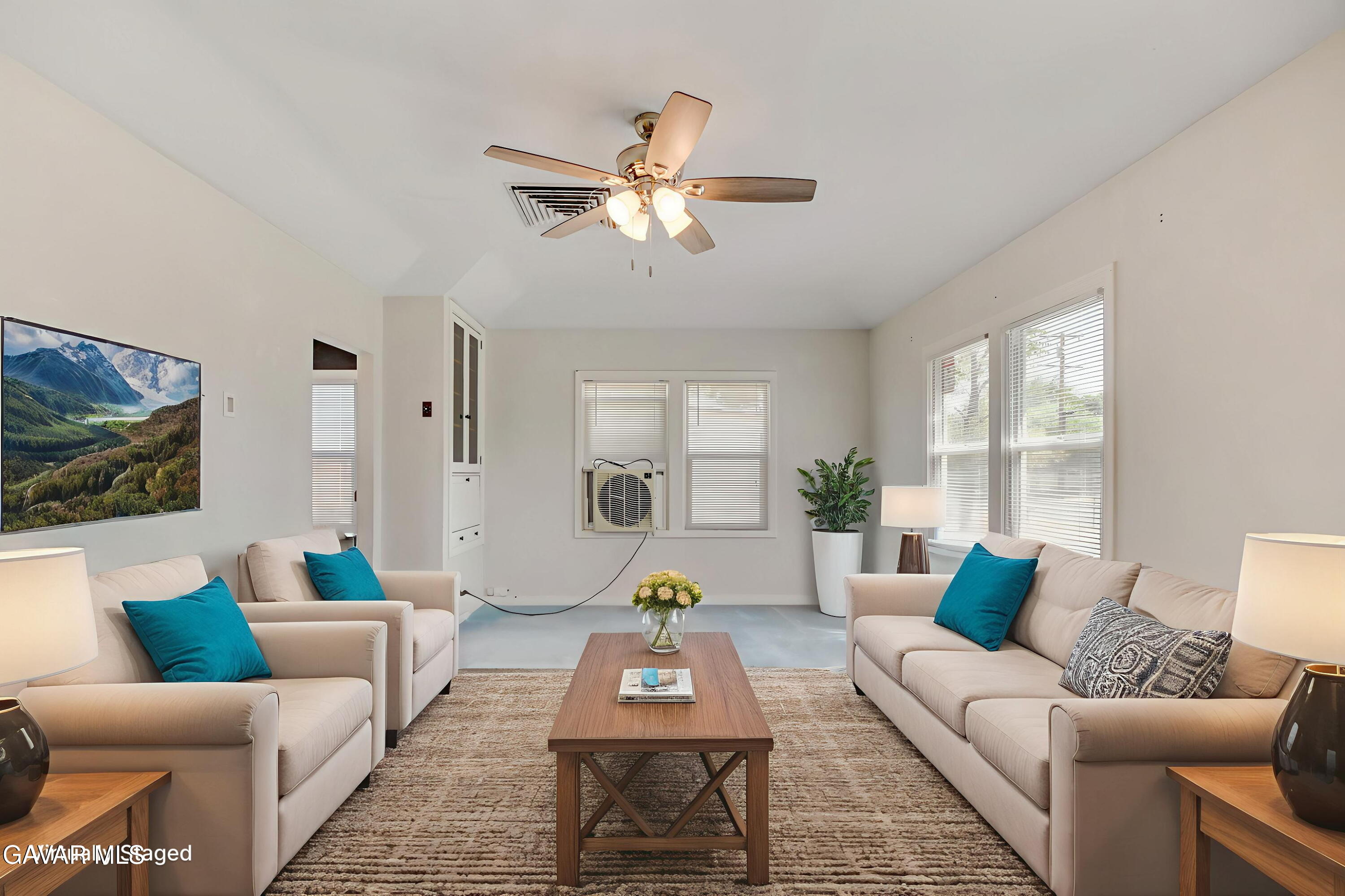 43517 7th Street East Lancaster, CA 93535 - Photo 5 of 47 a living room with furniture and a window