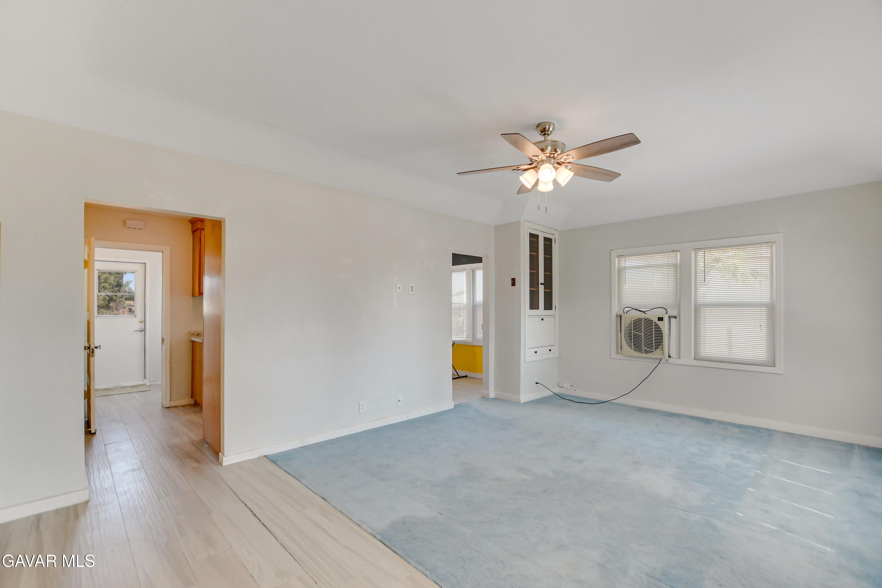 43517 7th Street East Lancaster, CA 93535 - Photo 7 of 47 a view of an empty room with a window