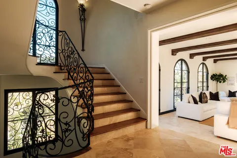 a view of front door with stairs