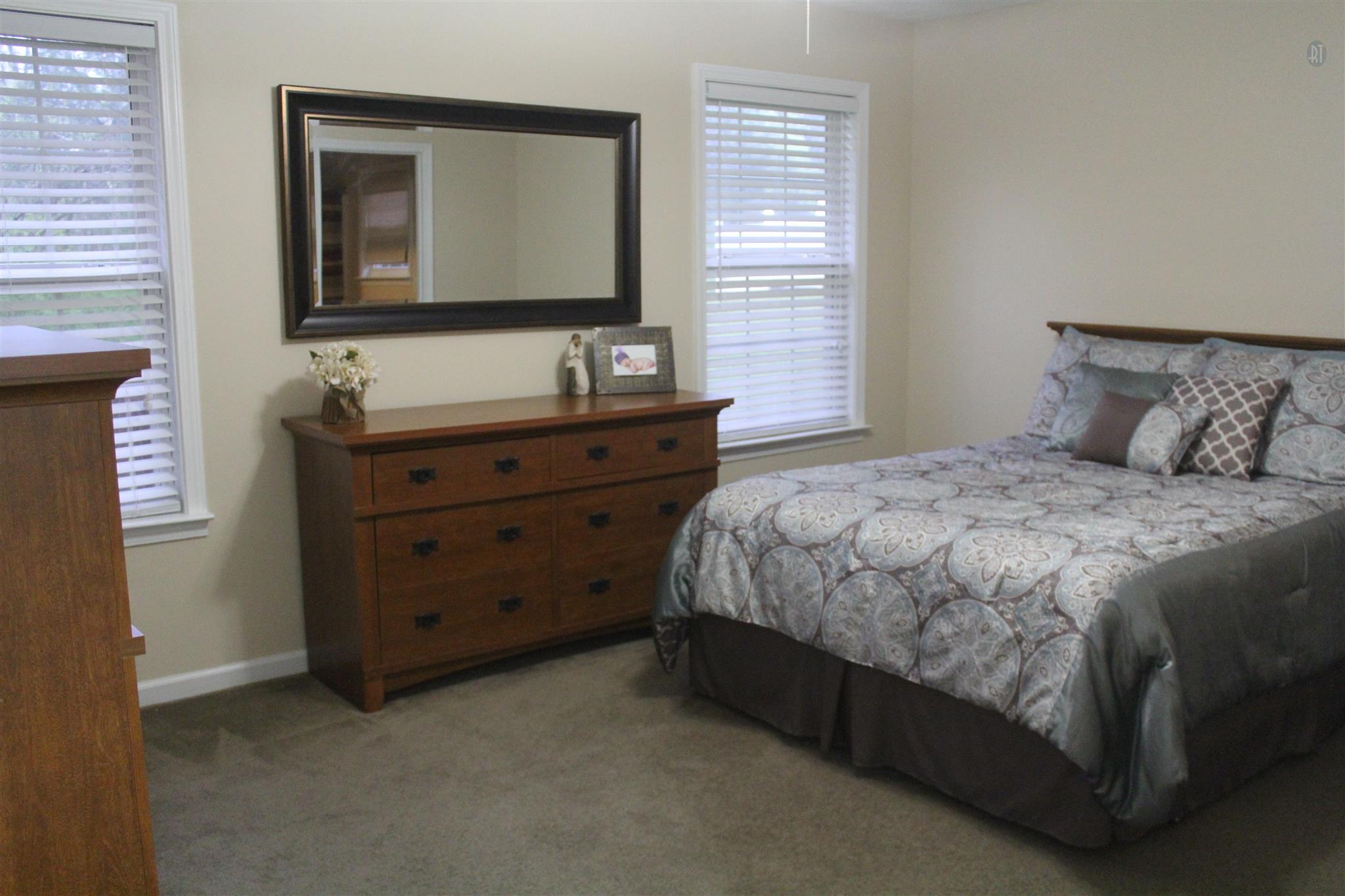 1638 Sulphur Springs Road Murfreesboro, TN 37129 - Photo 6 of 13 Large master bedroom with on suite bathroom and walk in closet.