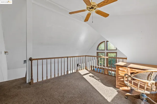 a view of a balcony with wooden floor