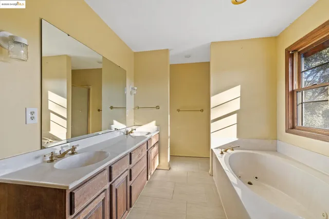 a view of a brick house with a large window