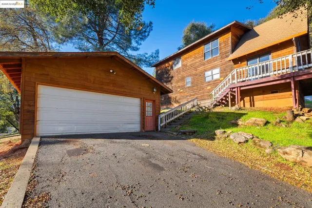 a view of swimming pool with a yard and seating area