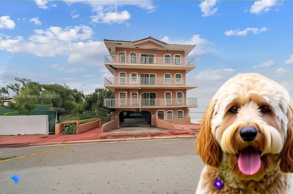 a view of building with outdoor space and seating area