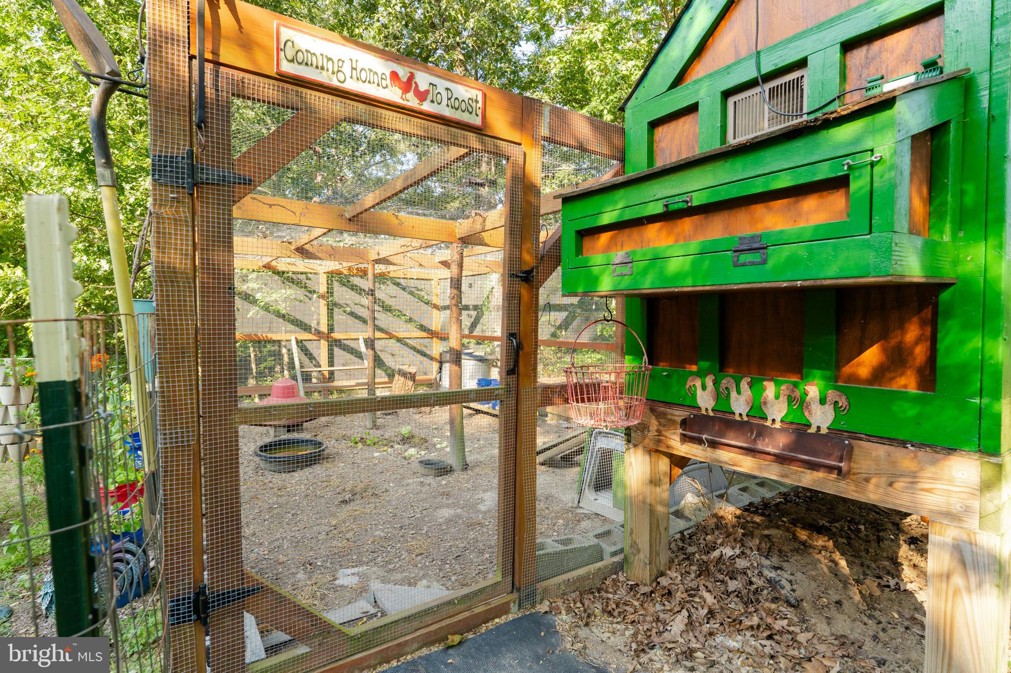 82 Sabrina Lane Gerrardstown, WV 25420 - Photo 15 of 104 a view of a porch with a floor to ceiling window next to a brick building