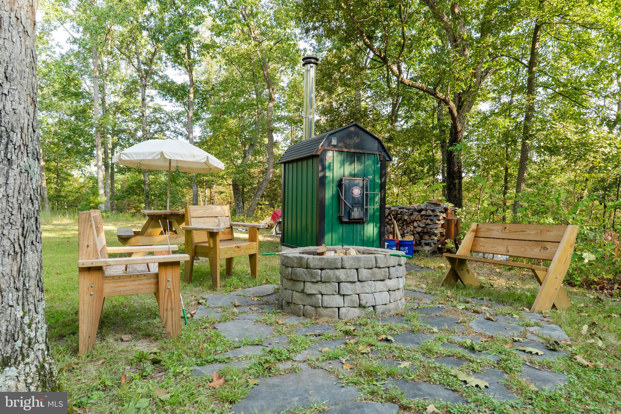 82 Sabrina Lane Gerrardstown, WV 25420 - Photo 16 of 104 a view of a house with backyard porch and sitting area