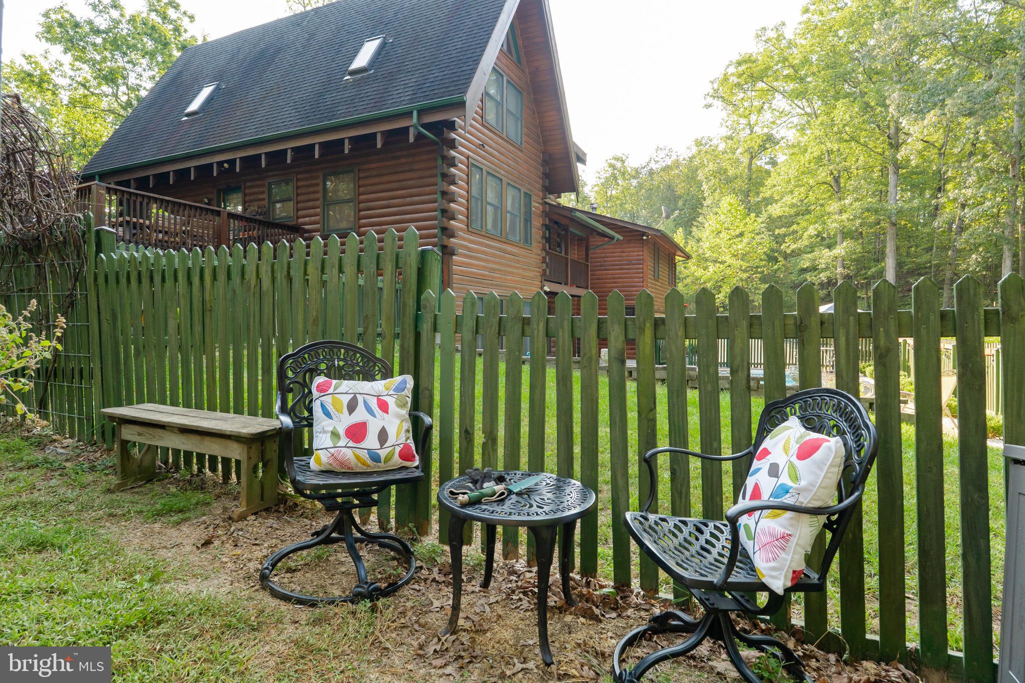 82 Sabrina Lane Gerrardstown, WV 25420 - Photo 20 of 104 a view of a chairs and table in patio