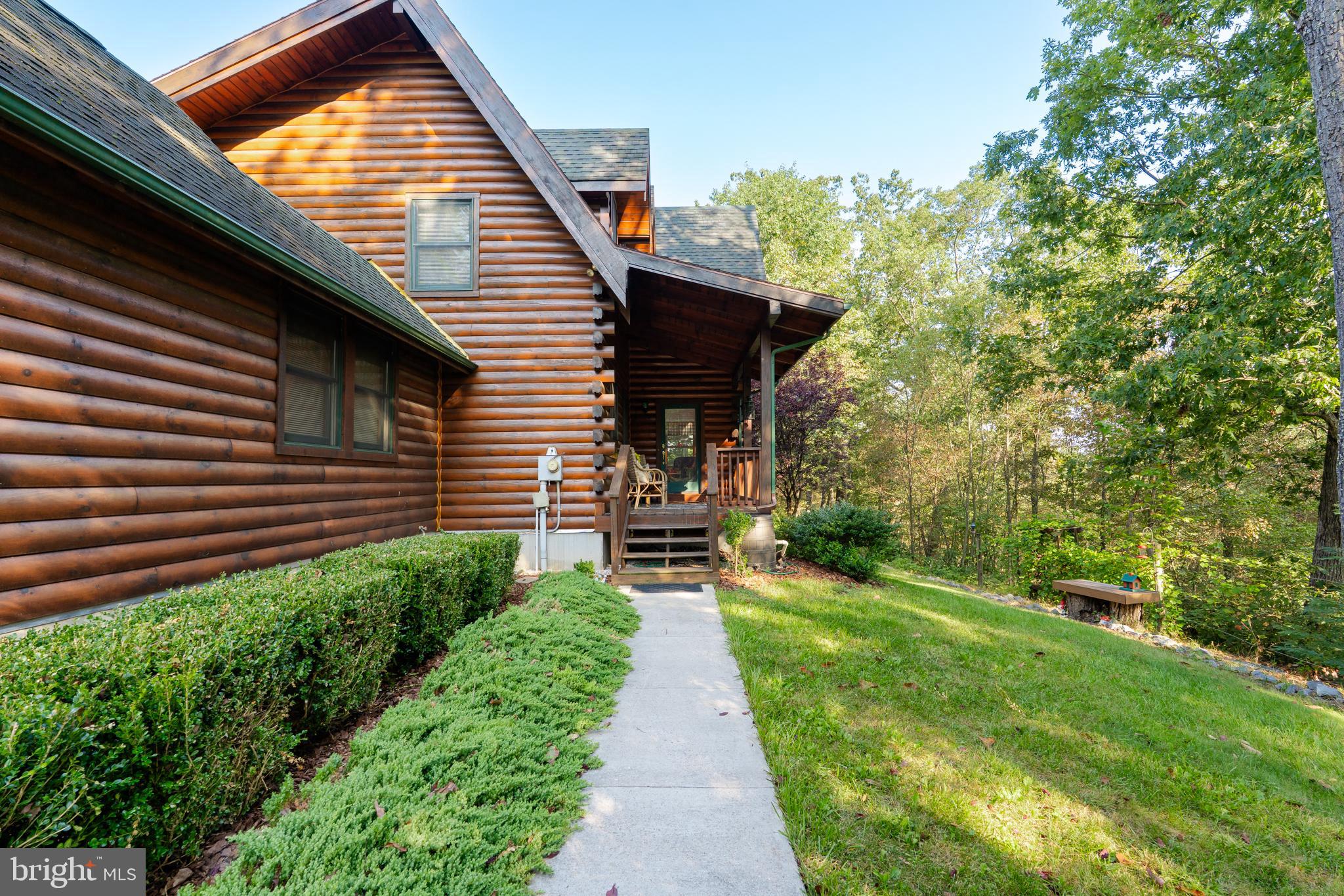 82 Sabrina Lane Gerrardstown, WV 25420 - Photo 28 of 104 a view of a pathway of the house and a yard
