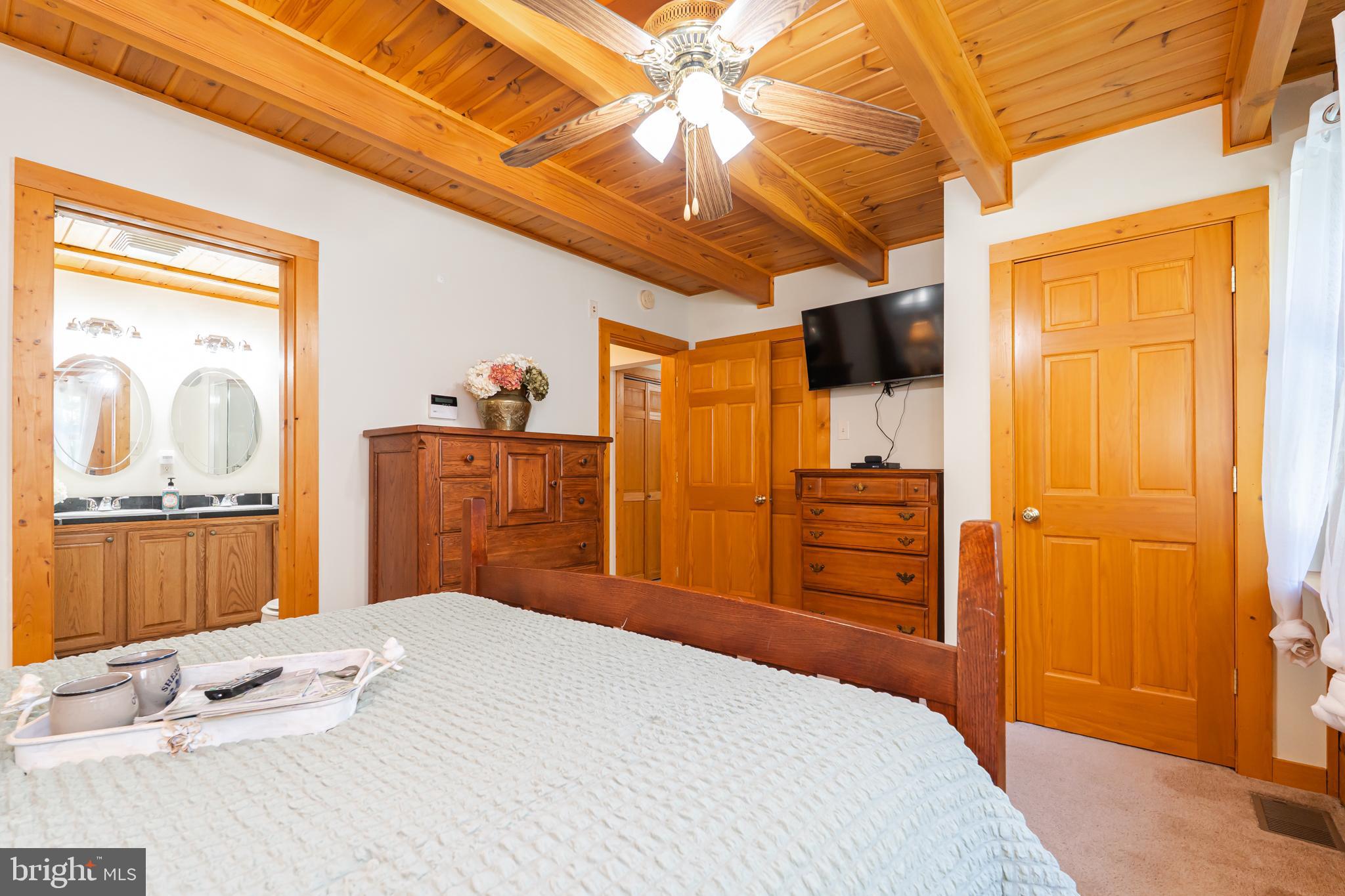 82 Sabrina Lane Gerrardstown, WV 25420 - Photo 49 of 104 a bedroom with a bed and a dresser