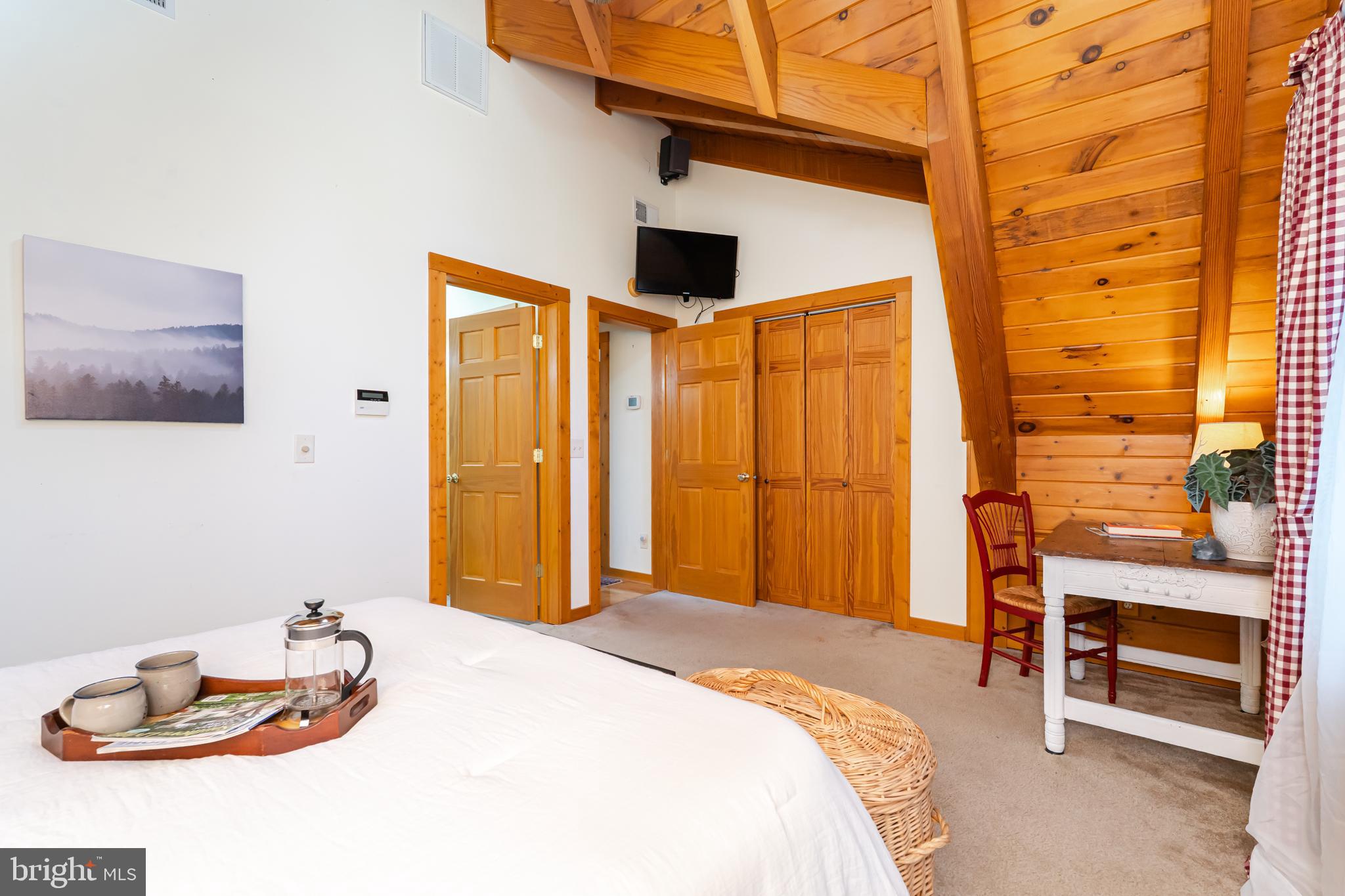 82 Sabrina Lane Gerrardstown, WV 25420 - Photo 76 of 104 a bedroom with a bed and a chair