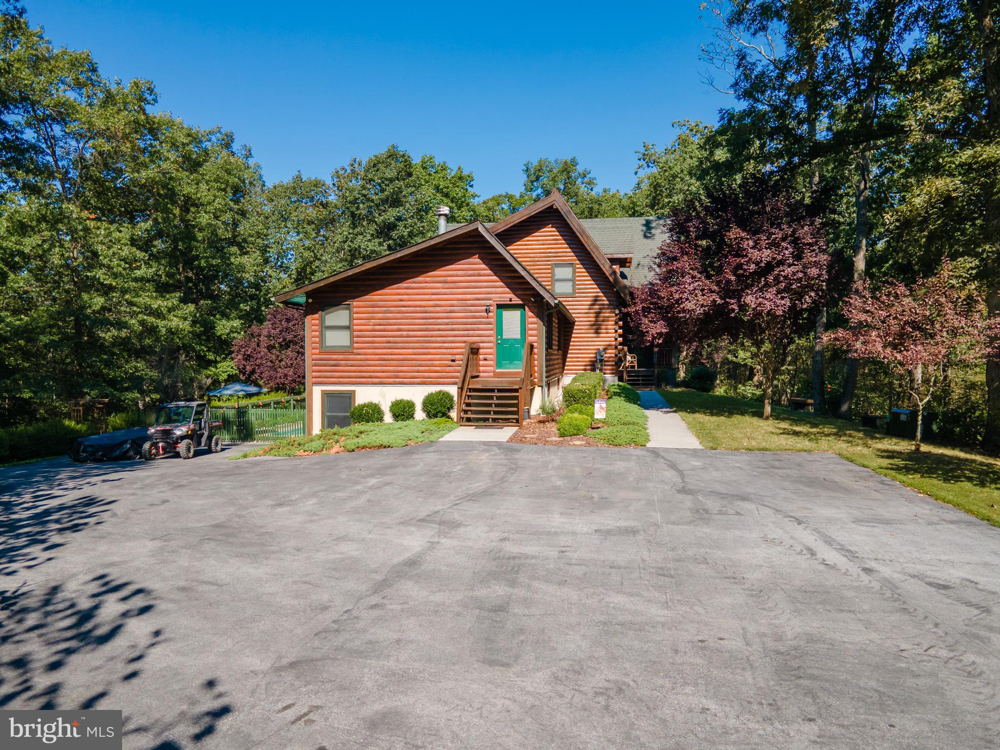 82 Sabrina Lane Gerrardstown, WV 25420 - Photo 89 of 104 a view of outdoor space with yard and trees in the background