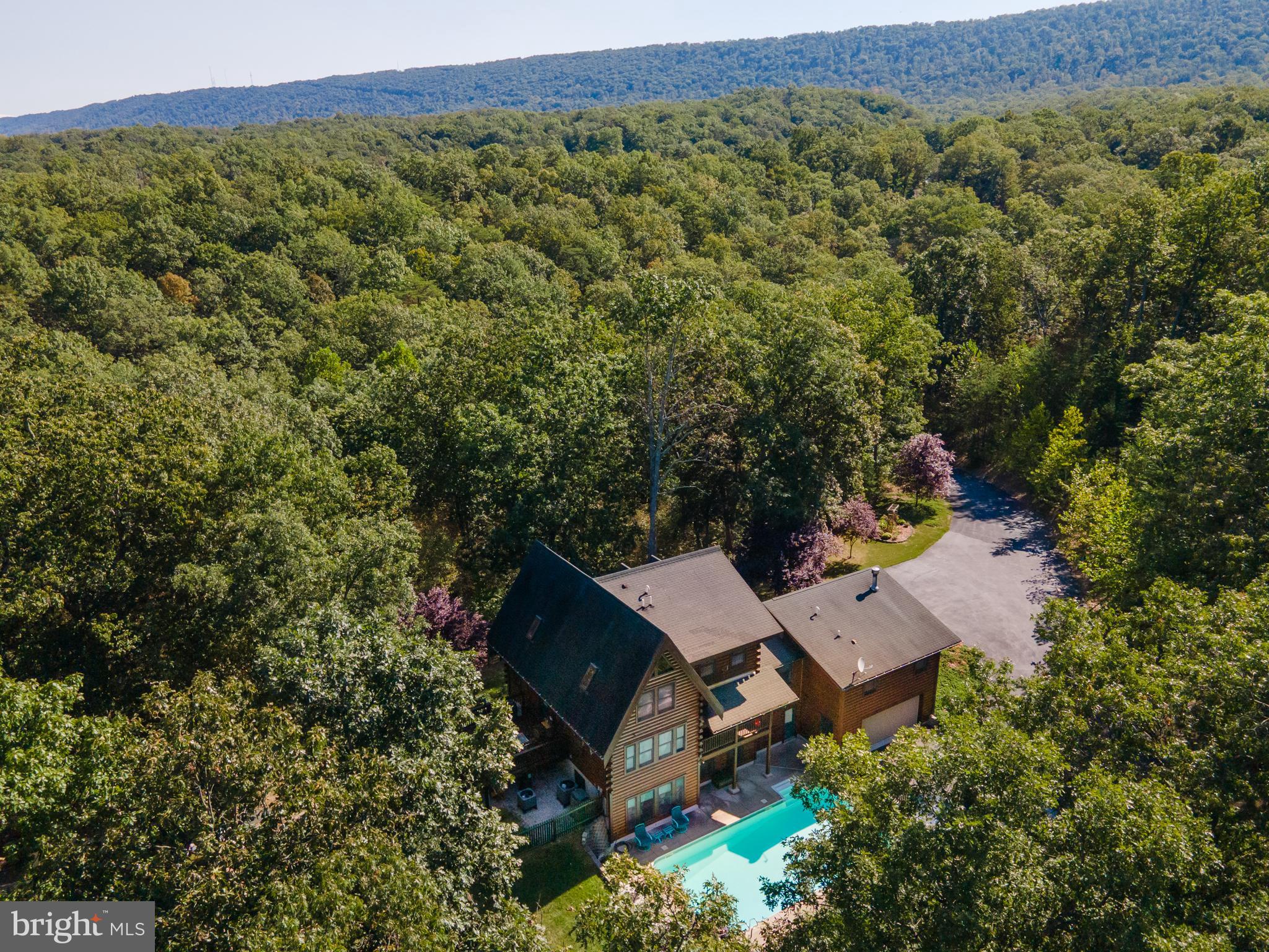 82 Sabrina Lane Gerrardstown, WV 25420 - Photo 94 of 104 an aerial view of a house with a yard