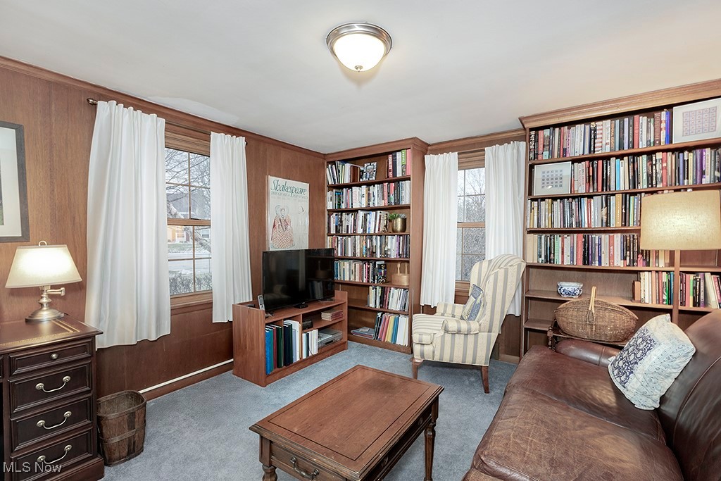 14711 South Woodland Road Cleveland, OH 44120 - Photo 15 of 31 Paneled Study/TV Room/Library with Built-in Shelves. Wall to wall carpet over Hardwood.