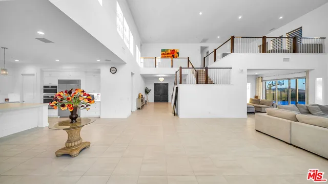 a bathroom with a sink vanity mirror and toilet