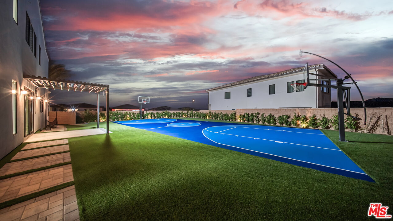 12553 Ridgeline Road Porter Ranch, CA 91326 - Photo 32 of 45 a view of swimming pool with lawn chairs and a yard