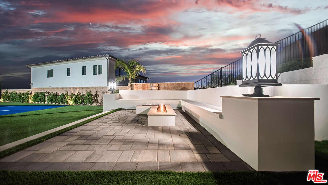 12553 Ridgeline Road Porter Ranch, CA 91326 - Photo 36 of 45 a view of a house with a yard