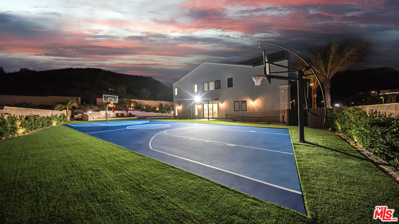 12553 Ridgeline Road Porter Ranch, CA 91326 - Photo 37 of 45 a view of a building with a yard