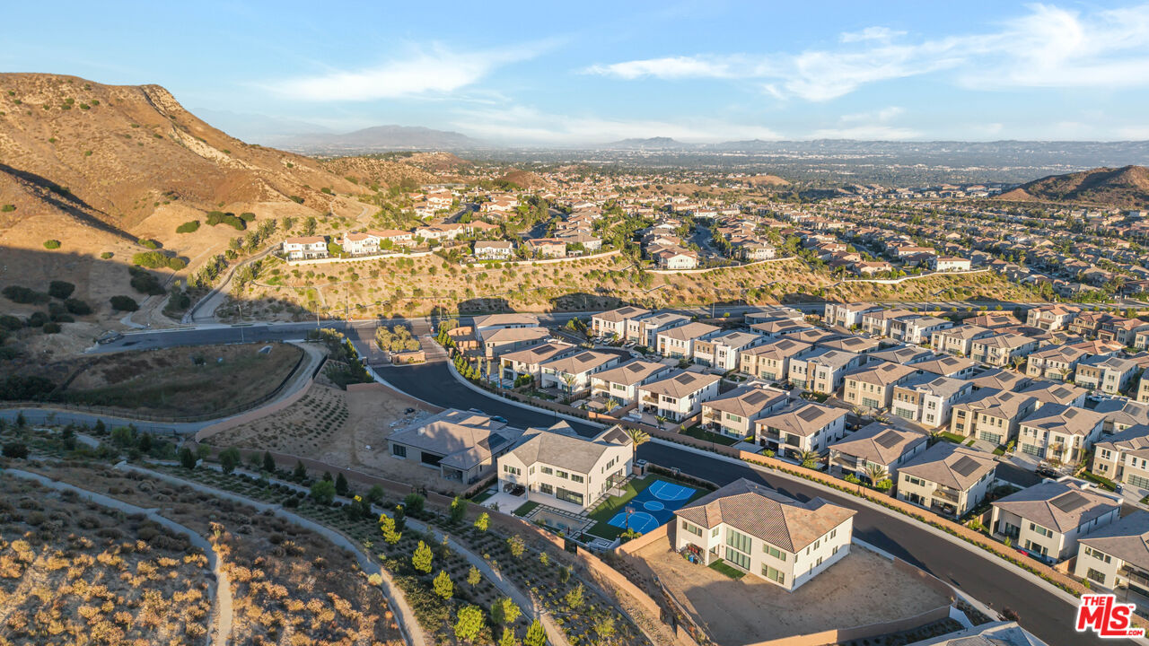 12553 Ridgeline Road Porter Ranch, CA 91326 - Photo 6 of 45 an aerial view of residential building and car parked