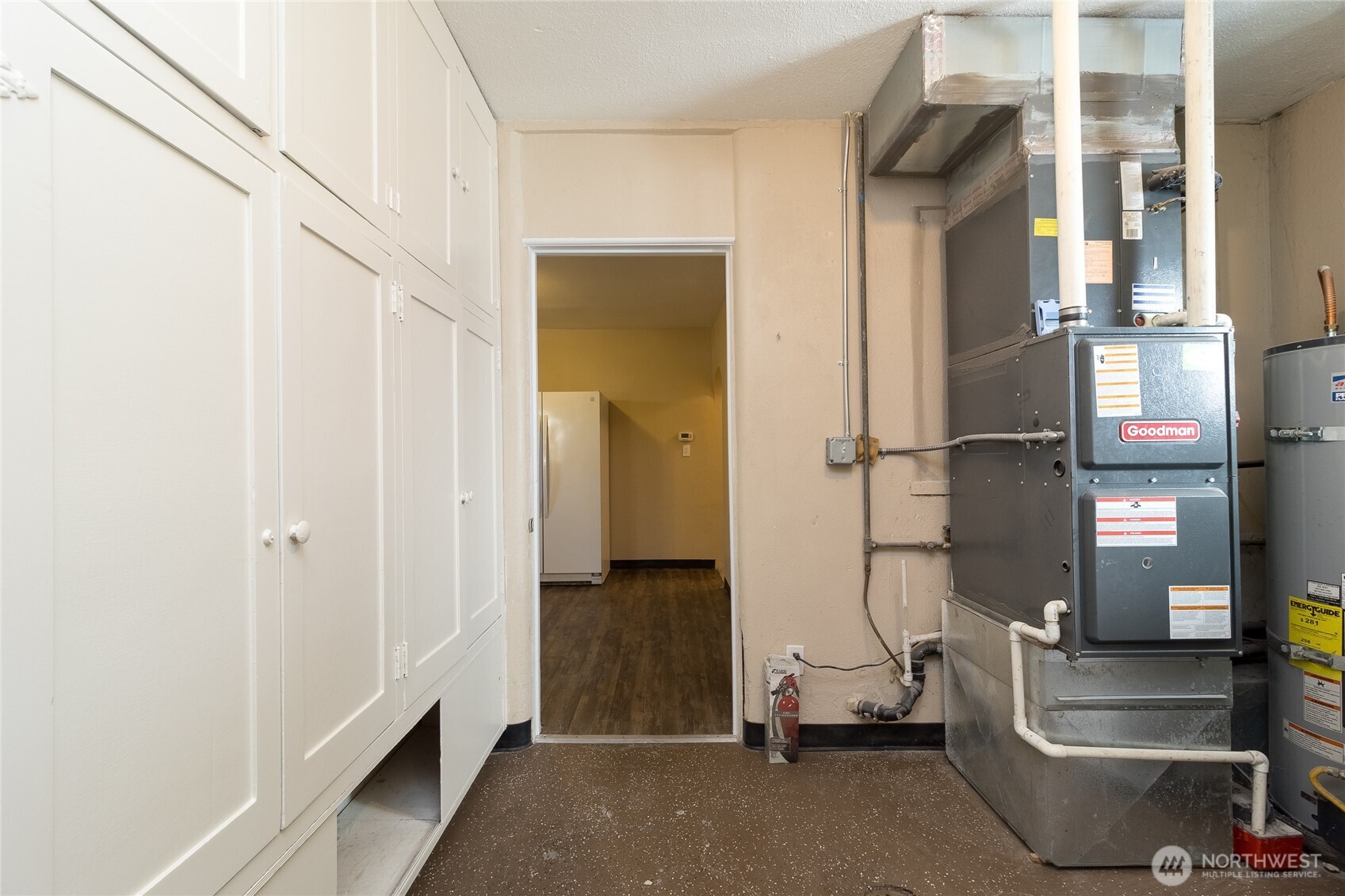 627 Juniper Street Walla Walla, WA 99362 - Photo 17 of 29 a view of hallway with stairs and a couch
