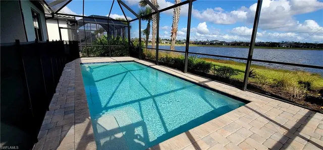 a view of a balcony with yard
