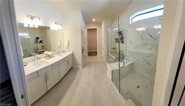 a view of a storage & utility room with racks on the wall