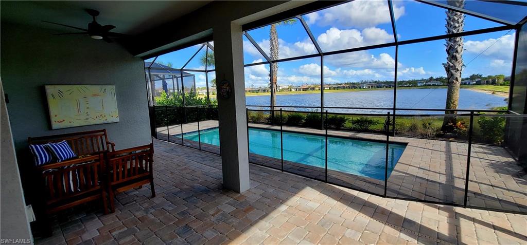 2045 Yellowfin Circle Naples, FL 34114 - Photo 20 of 23 a view of a porch with furniture
