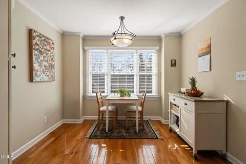 a kitchen with stainless steel appliances granite countertop a refrigerator stove and sink