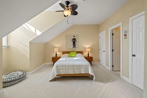 a bathroom with a granite countertop sink toilet a mirror and a shower