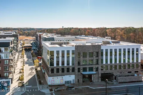 a childrens park with lots of swings and slides