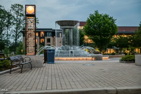 a view of a garden with a fountain