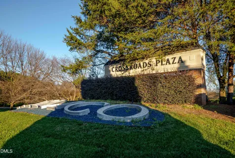 a view of a cafe with sitting area