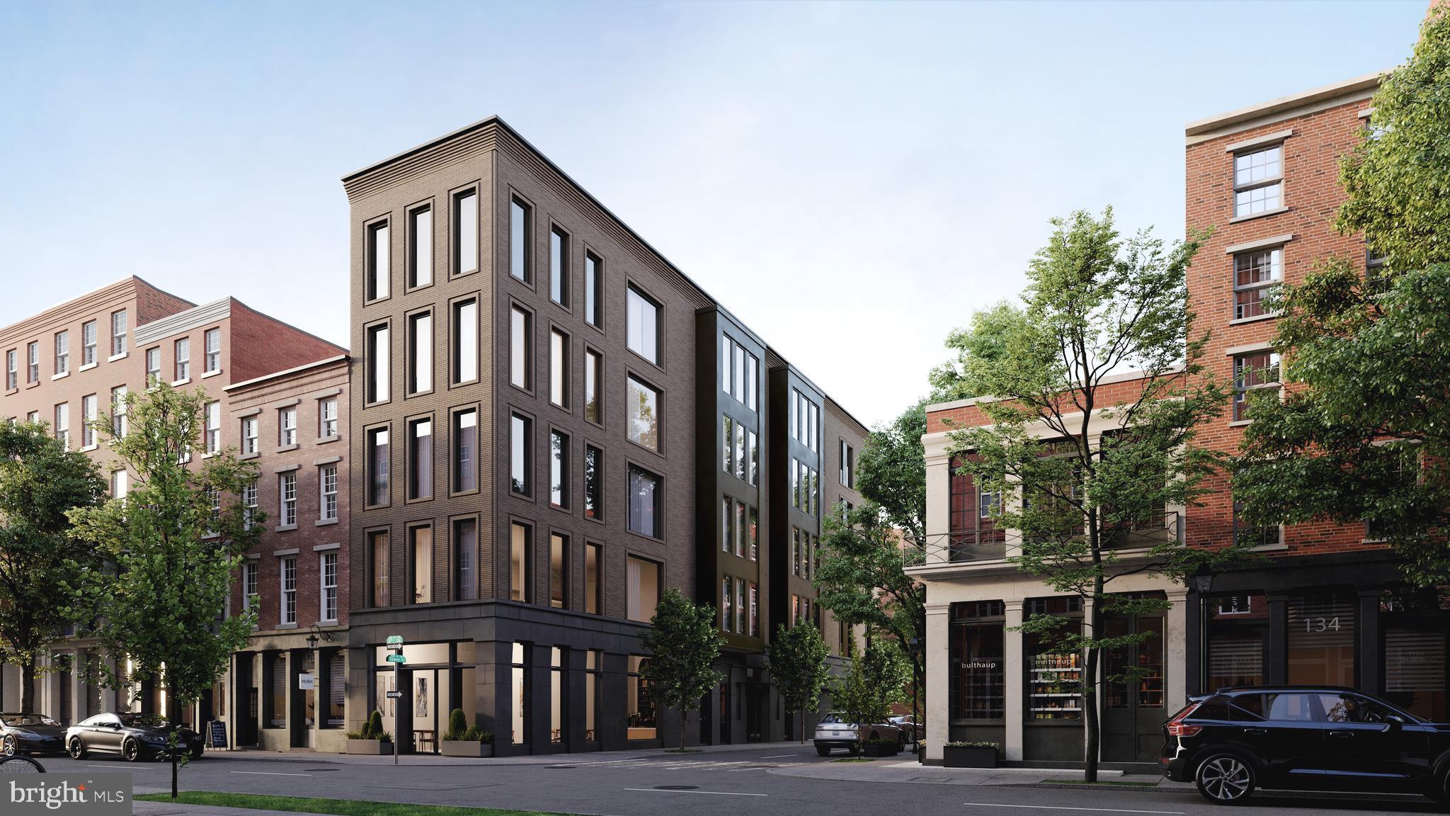 a front view of a building and a yard