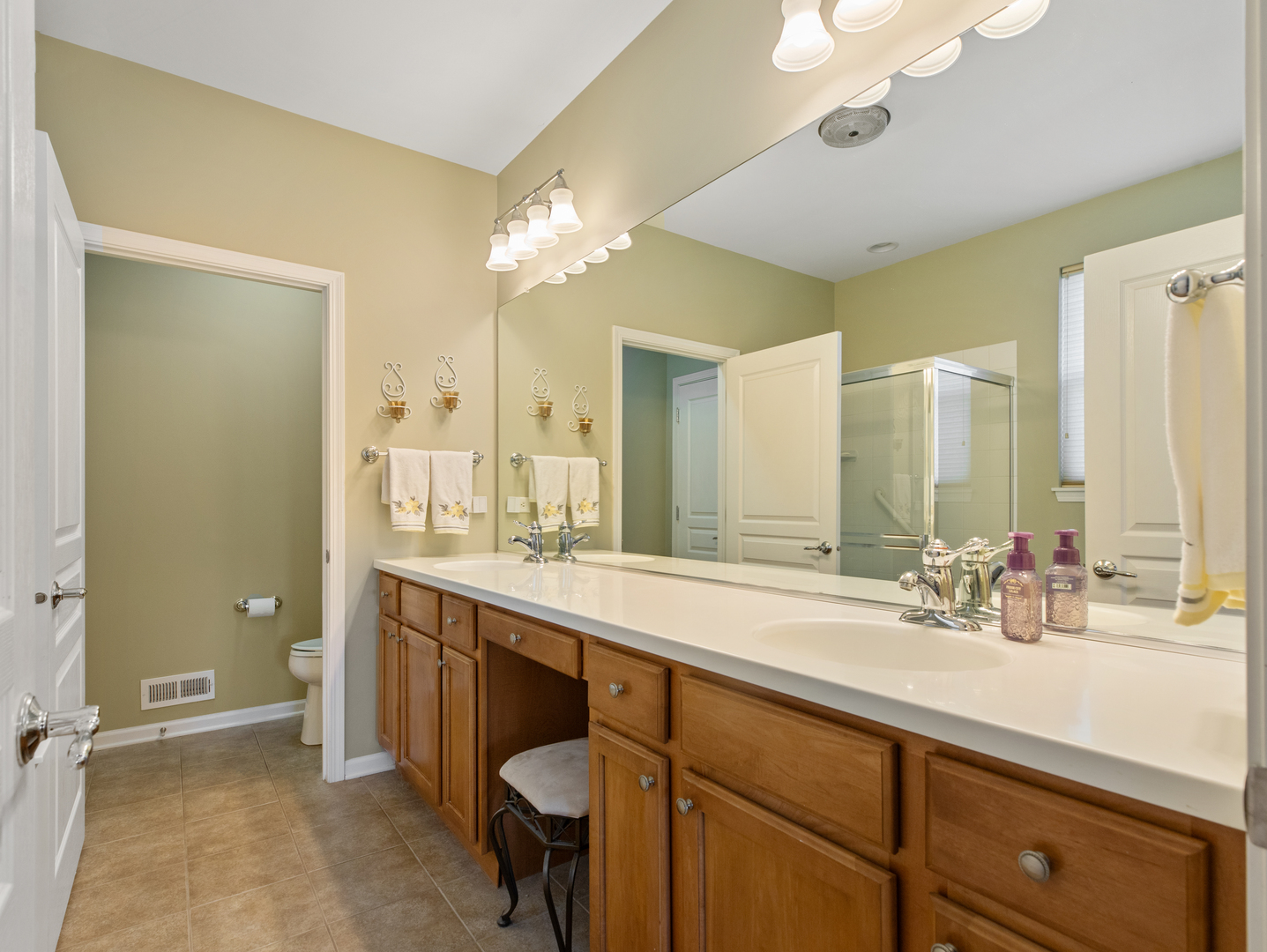 3001 Ravinia Circle Mundelein, IL 60060 - Photo 19 of 35 a bathroom with a double vanity sink mirror and toilet
