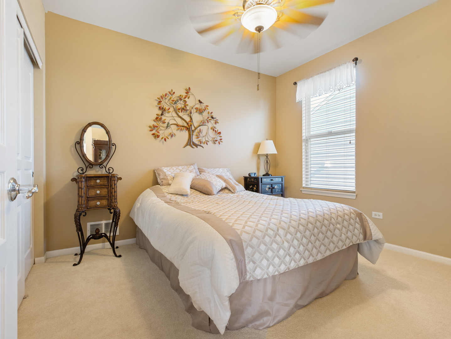 3001 Ravinia Circle Mundelein, IL 60060 - Photo 21 of 35 a bedroom with a bed and a chandelier