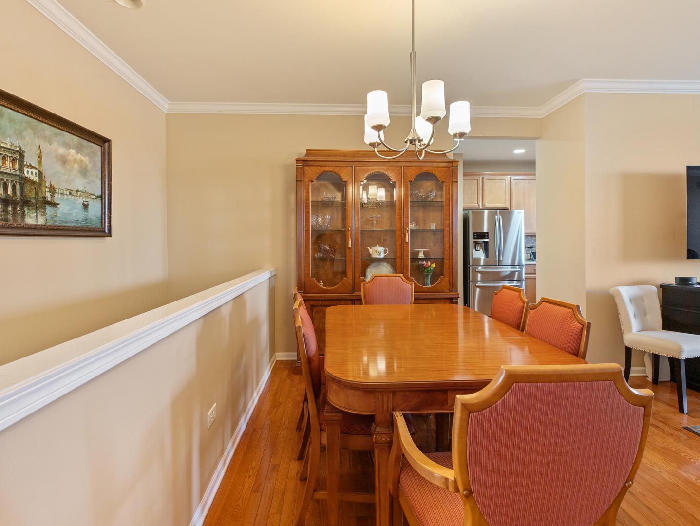 3001 Ravinia Circle Mundelein, IL 60060 - Photo 7 of 35 a view of a dining room with furniture and wooden floor