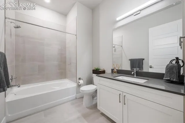 a view of a balcony with chairs