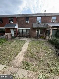 a view of an house with backyard space